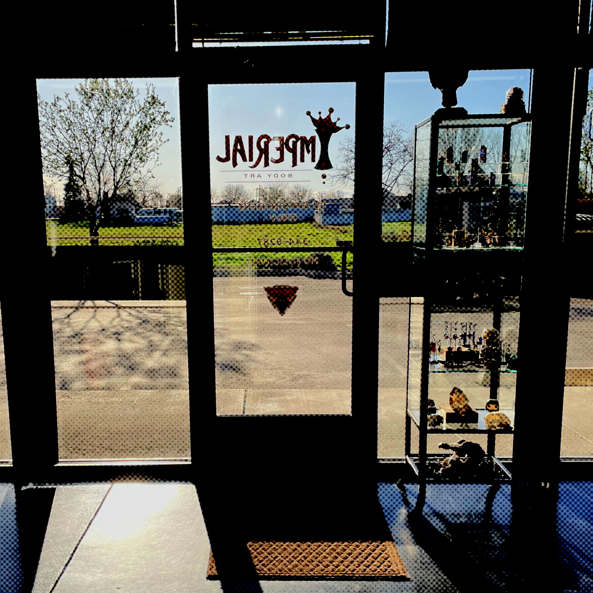 Photo of sunset from inside the tattoo and piercing shop Imperial Body Art in Meridian, Idaho